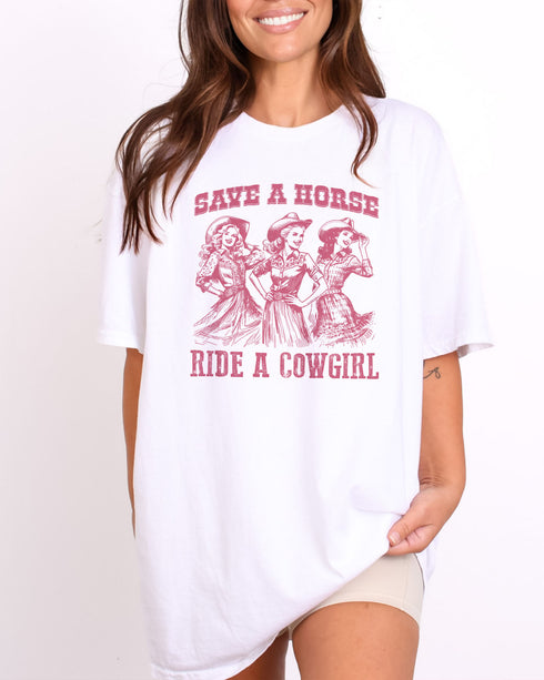Model wearing white color shirt with 'Save A Horse Ride A Cowgirl' graphic design